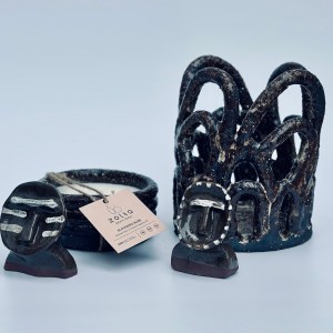 Handbuilt ceramic vessel by artist Sirin AlMasri, featuring an open lattice structure of interwoven arches in dark, sand-textured stoneware with a transparent glaze finish. Inspired by Middle Eastern architectural forms.