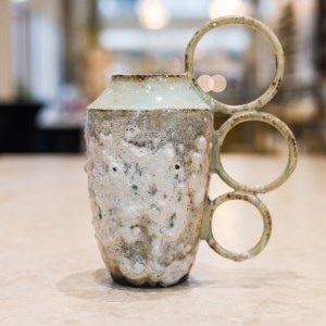 Sirin AlMasri Ceramic artwork vase with three earrings at Zolta Ceramics Studio Vienna