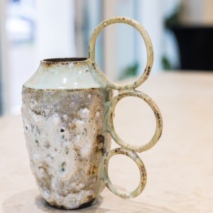 Sirin AlMasri Ceramic artwork vase with three earrings at Zolta Ceramics Studio Vienna